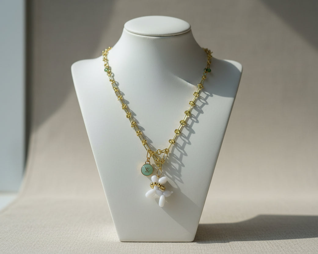 254- Upcycled Gold Necklace with White Balloon Dog and Light Blue charm