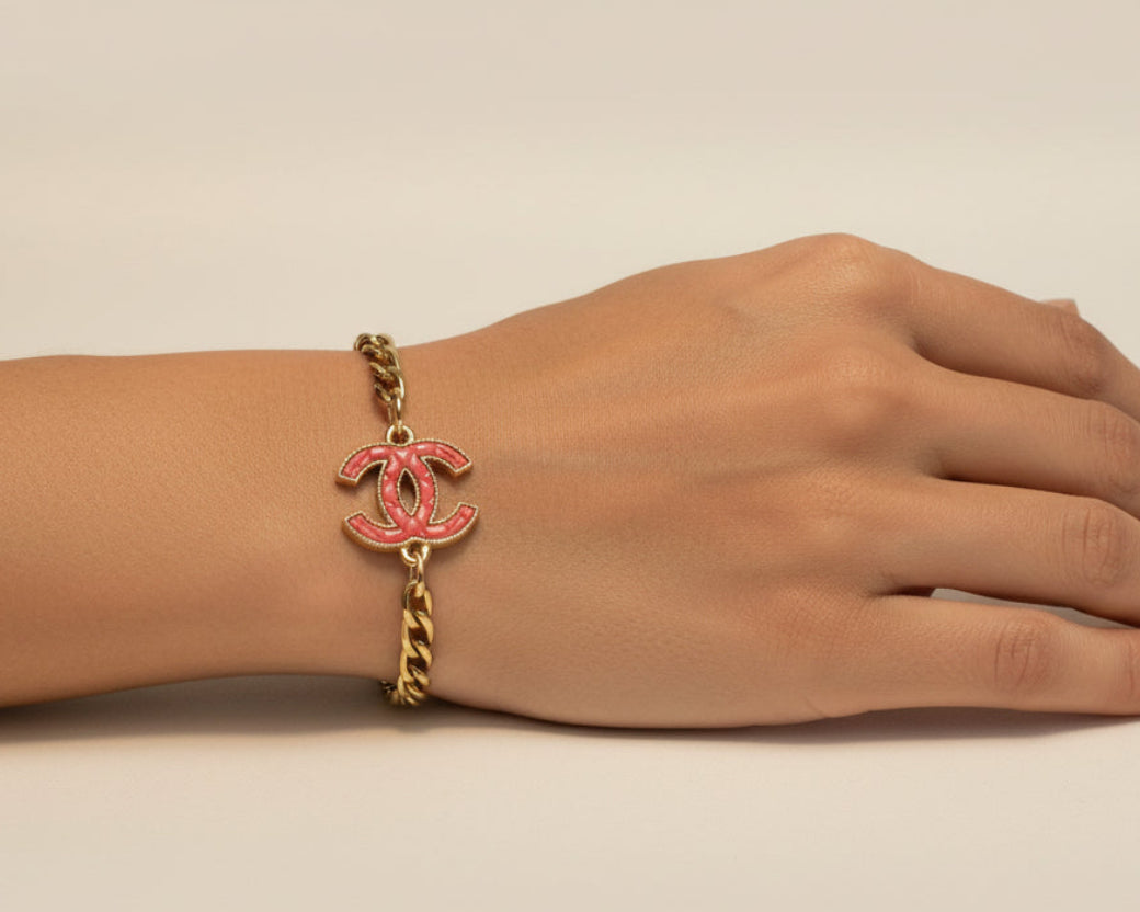 67 - Upcycled Pink Pendant on a Gold Bracelet