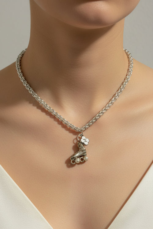 138 - Upcycled White Clover Pendant Necklace with Roller Skate Pendant on Silver Chain
