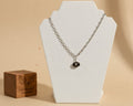 215- Upcycled Silver and Black charm Necklace on a Silver Chain