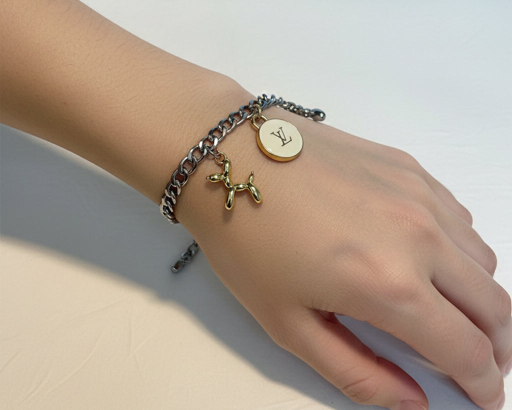 56- Upcycled Silver  charm Bracelet with Gold and Silver Balloon Dog Charms