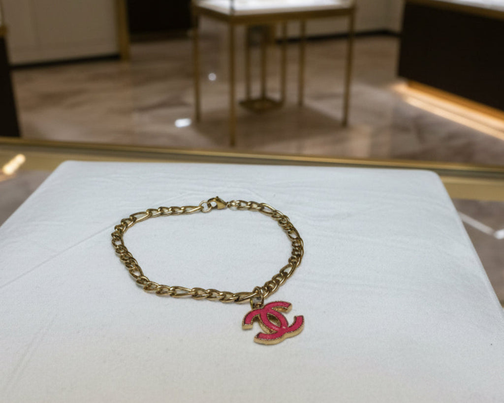 67 - Upcycled Pink Pendant on a Gold Bracelet