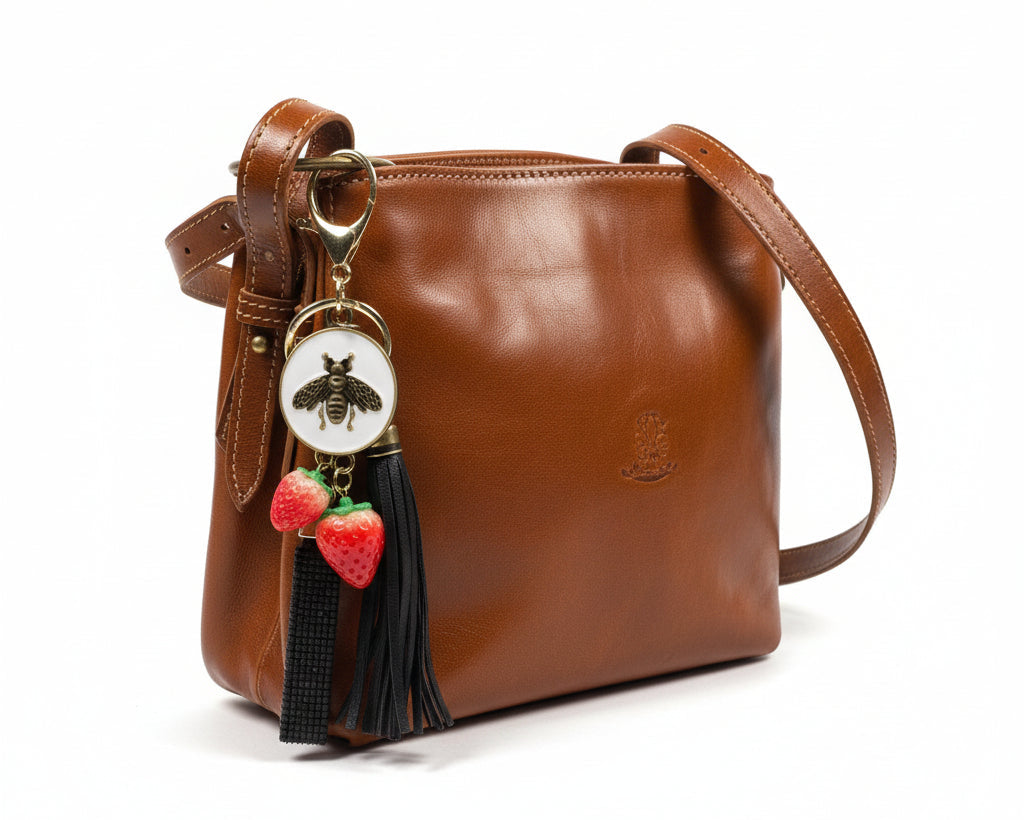 734-  Upcycled White Bee with a Black Tassel and Wristlet and Strawberries Bag Charm