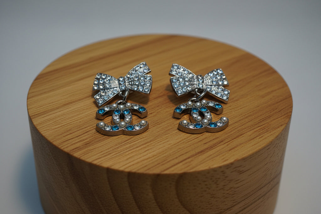 455 - Upcycled Silver Bow Charm Earrings with Clear and Blue Rhinestones