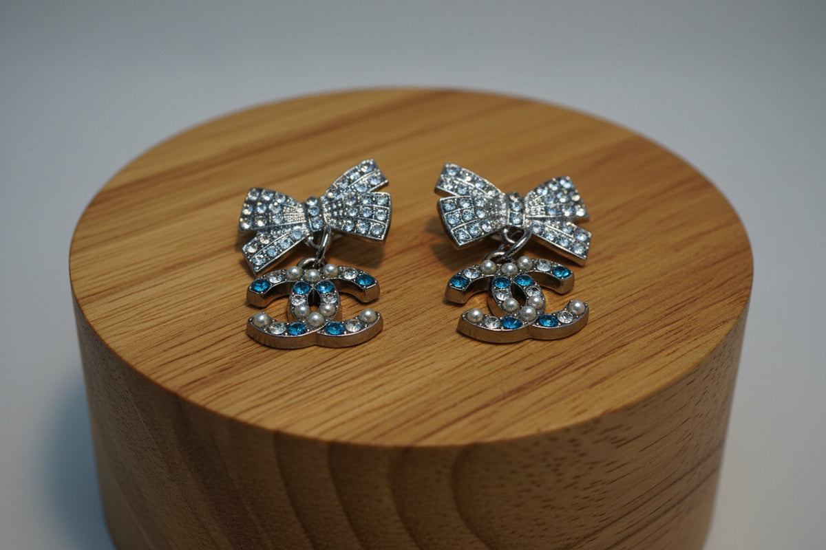 455 - Upcycled Silver Bow Charm Earrings with Clear and Blue Rhinestones