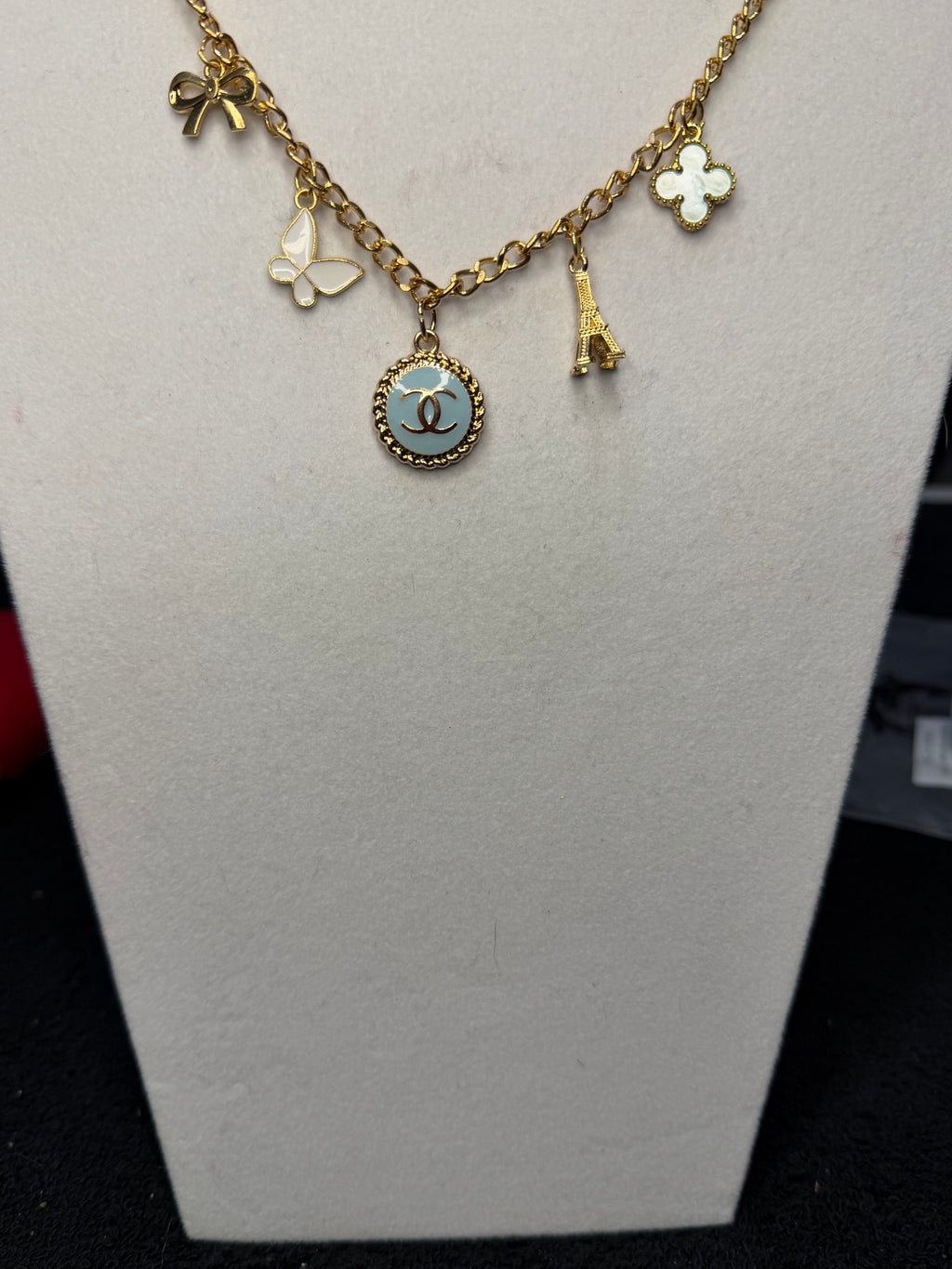 232- Upcycled Blue Pendant and multi Charm Necklace